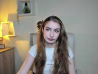 Hey, I’m Nina – blonde hair, green eyes, and tattoos that love to tell their own stories. My taste in music? Somewhere between Doja Cat’s groove and Rammstein’s fire ? I adore singing, dancing, and just vibing with the right energy. Sometimes I’m your sweet daydream, sometimes your wild rock chick – depends on which song is playing ?